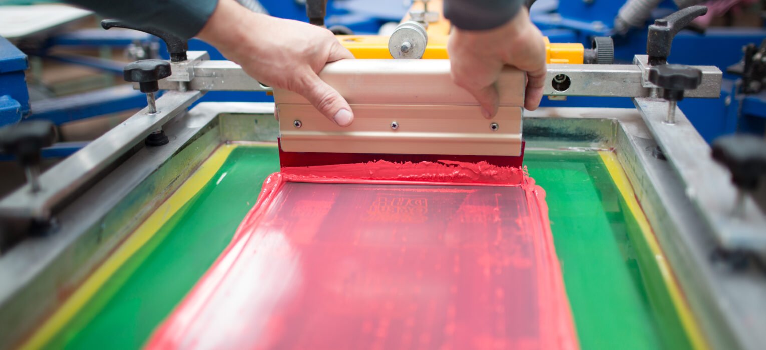 Screen Printing or Heat Press: Which Is Best for Custom Apparel?
