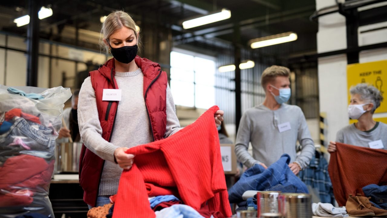 volunteers-sorting-out-donated-clothes-in-communit-2026-01-05-22-48-45-utc (1)